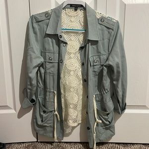 Green jacket with lace